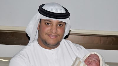 Fares, son of Huda Mohamed and Saeed Salem, with his father. He was born at 7.00am on New Year’s Day at Corniche Hospital. Courtesy Corniche Hospital