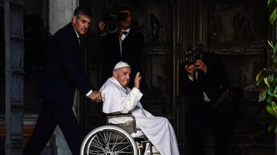 Pope Francis, pictured in a wheelchair following knee treatment, has postponed a visit to the Democratic Republic of Congo and South Sudan. AFP