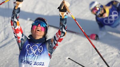 Therese Johaug of Norway celebrates her gold medal winning performance in the Women's 7.5km+7.5km Skiathlon competition at the Zhangjiakou National Cross-Country Skiing Centre at the Beijing 2022 Olympic Games in China. EPA