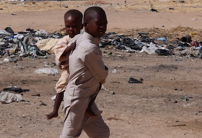 Young refugees from El Fasher, in western Sudan, at Tine transit camp in eastern Chad. Reuters
