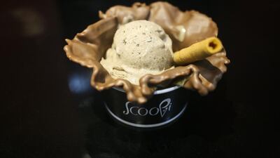 Scoopi Cafe has a new twist one ice cream. It takes the dish in liquid form and uses liquid nitrogen to freeze into the scoops we’re all familiar with. Seen here is the final product, Nutella ice cream in a chocolate waffle cone. Lee Hoagland / The National