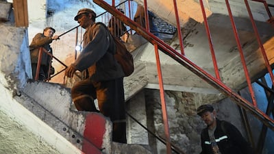 Miners return to the surface from a shift at the Lonea coal mine in Petrila, Romania. An IMF article is calling for coal use to be phased out across emerging markets, but acknowledged that miners "deserve realistic solutions to the potential disruption they face". AFP.