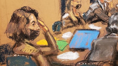 Ghislaine Maxwell sits with her defence lawyers during her trial in New York City. Reuters