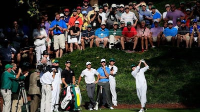 Niall Horan of the band One Direction plays a shot at the ninth hole on Wednesday at the Masters Par-3 Contest at Augusta National. Jamie Squire / Getty Images / AFP / April 8, 2015