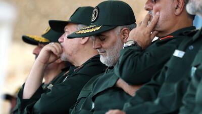 Gen Qassem Soleimani, centre, who heads the elite Quds Force of Iran's Revolutionary Guard attends a graduation ceremony of a group of the guard's officers in Tehran, Iran. AP