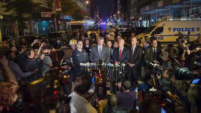Mayor Bill de Blasio, centre, and NYPD chief of department James O’Neill, centre right, speak during a press conference near the scene of the explosion on West 23rd street. Andres Kudacki / AP Photo