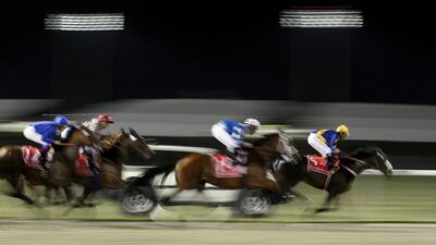 Brazilian jockey Tiago Pereira, right, leads Gloria De Campeao to win the 15th Dubai World Cup at Meydan Racecourse in 2010. Marwan Naamani / AFP