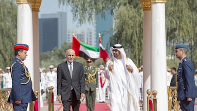 Sheikh Mohammed bin Zayed, the Crown Prince of Abu Dhabi and Deputy Supreme Commander of the Armed Forces, welcomes the president of Afghanistan, Ashraf Ghani, to Mushrif Palace in Abu Dhabi. Ryan Carter / Crown Prince Court Abu Dhabi