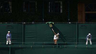 Vitalia Diatchenko serves to Anna-Lena Friedsam during their first round match on the first day of Wimbledon 2015 on Monday, Carl Court / Getty Images