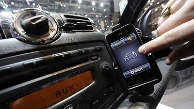 Car makers want to go a step further than allowing a driver to interact with the car via an iPhone. Adrian Moser / Bloomberg News