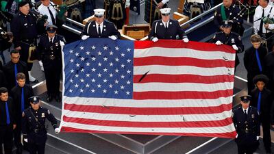 September 11, 2011. The flag that flew over the World Trade Center on 9/11 is seen during ceremonies marking the 10th anniversary of the 9/11 attacks on the World Trade Center, in New York. Mark Blinch / Reuters