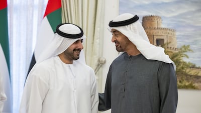 President Sheikh Mohamed, right, with Sheikh Zayed bin Tahnoon bin Mohammed. Hamad Al Kaabi / UAE Presidential Court