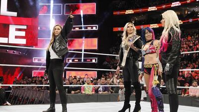 Ronda Rousey, left, will make her first WWE appearance since the Royal Rumble at Elimination Chamber on February 25 when the make-up of the women's title matches at WrestleMania 34 and who will be facing who should become a lot clearer. Image courtesy of WWE.