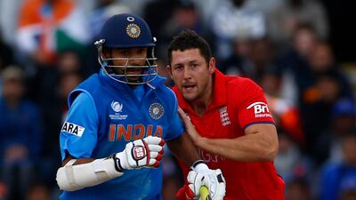 Dhawan was again in the thick of it as he collided with Tim Bresnan as he stole a quick run. No offence taken by either player, but it got so dark, the dreaded rain was expected to dampen spirits. Darren Staples / Reuters