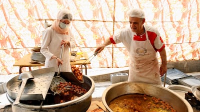An Iranian chef at a sweet shop in Tehran. US President Donald Trump wants frozen Iranian funds to be spent on American food products. EPA