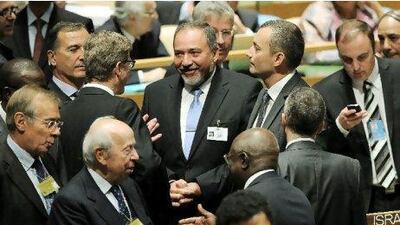Avigdor Lieberman, centre, the Israeli foreign minister, speaks to other delegates during the general debate at the 66th session of the United Nations General Assembly in New York. EPA / JUSTIN LANE