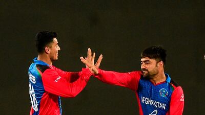 Afghanistan captain Rashid Khan, right, is struggling with his fitness. AFP
