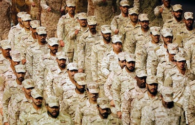 Saudi soldiers parade during a concert in Riyadh on Saturday. AP Photo.