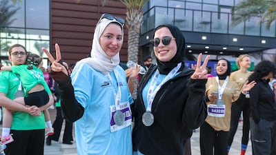 Participants celebrate after A Run for Hope on Saadiyat Island