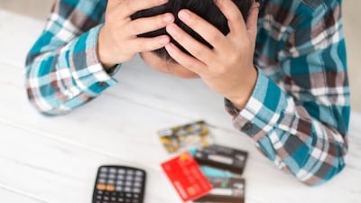 Money shame can lead people to overspend to “keep up with the Joneses”, avoid their finances or criticise others who are struggling. Photo: Getty Images