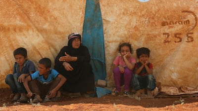 Displaced Syrians in the northern part of Syria's rebel-held Idlib province. Zein Al Rifai / AFP