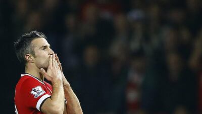 Manchester United’s Robin van Persie celebrates his goal against Hull City during their English Premier League soccer match at Old Trafford in Manchester, northern England, November 29, 2014. REUTERS/Darren Staples
