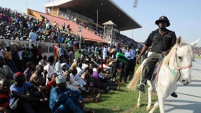 A policeman rides a horse as he patrols during the African Cup of Nations qualification match between Egypt and Nigeria, on March 25, 2016, in Kaduna. AFP / PIUS UTOMI EKPEI
