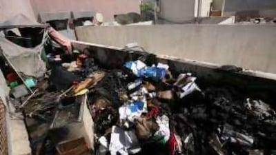 Residents say the most recent fire yesterday began in a pile of rubbish on a first-floor balcony of their building.
