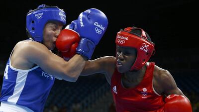 Nicola Adams of Britain and Sarah Ourahmoune of France compete during the women’s flyweight (51kg) boxing final at the Rio 2016 Olympic Games on August 20, 2016 in Rio de Janeiro, Brazil. Peter Cziborra / Reuters
