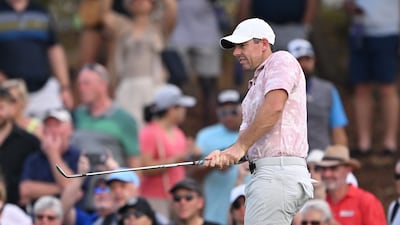 Rory McIlroy of Northern Ireland chips onto the ninth green during Day Three of the DP World Tour Championship. Getty Images