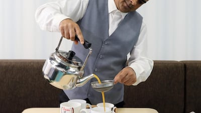 Mohammed Ismail prepares Karak Chai. Ravindranath K / The National