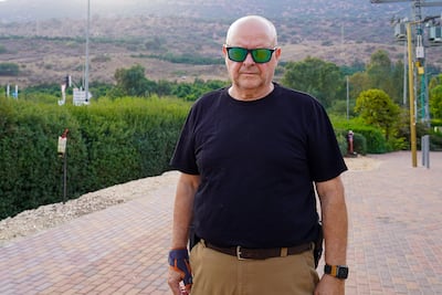 Gideon Harari has chosen to stay in his moshav in northern Israel despite the government asking people to evacuate. Willy Lowry / The National