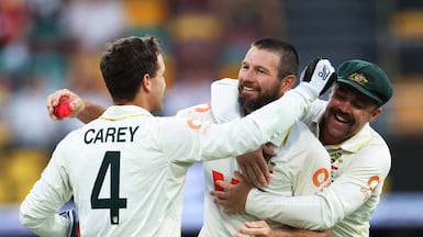 Cricket - The Ashes - Australia v England - Second Test - The Gabba, Brisbane, Australia - December 7, 2025 Australia's Michael Neser celebrates a five-wicket haul after taking the wicket of England's Brydon Carse, caught by Steve Smith REUTERS / Hollie Adams TPX IMAGES OF THE DAY