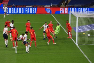 England's Danny Ings, no. 10, scores for England. AP
