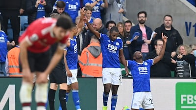 Leicester City striker Patson Daka, right, celebrates scoring his team's fourth goal in the 4-2 win over Manchester United. AFP
