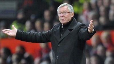 Sir Alex Ferguson has words of encouragement for Harry Redknapp. Clint Hughes / AP Photo
