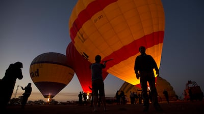 Hot-air balloons prepare to take off at dawn on the west bank of the Nile in Luxor, Egypt. AP Photo