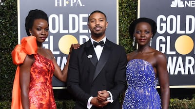 Lupita Nyong'o, Michael B Jordan and Danai Gurira arrive for the Golden Globes. AFP