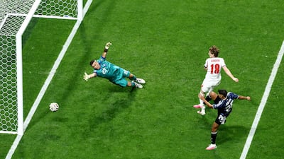 England's Anthony Gordon scores in the 55th minute. Reuters
