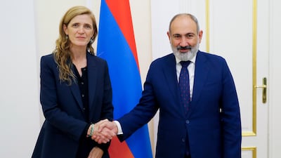 USAID chief Samantha Power and Armenian Prime Minister Nikol Pashinyan shake hands during their meeting in Yerevan. AP