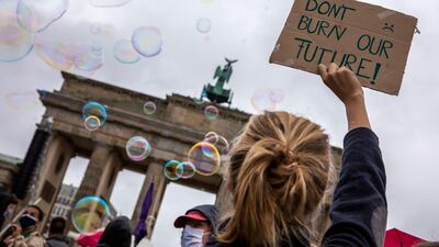 Climate activists gather on a "Global Day of Action" on September 25, in Berlin, Germany. Omer Messinger/Getty Images
