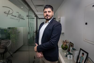 Panos Melekkis says he would advise his younger self to save more and not waste money on branded items. Antonie Robertson / The National