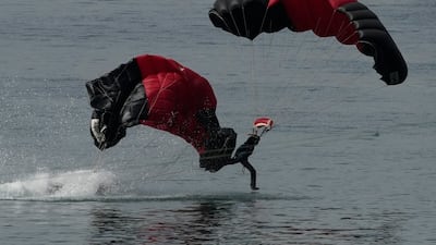 Sri Lankan army paratroopers crash land into the Indian Ocean. AP Photo