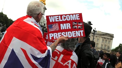 People wait in front of Buckingham Palace during the state visit of U.S. President Donald Trump and First Lady Melania Trump to Britain, in London, Britain, June 3, 2019. Reuters