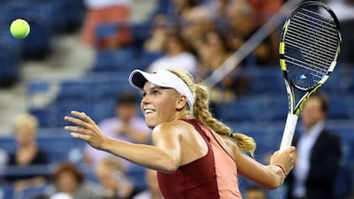 Caroline Wozniacki celebrates after beating Sara Errani to reach the US Open semi-finals on Tuesday in New York City. Streeter Lecka / Getty Images / AFP / September 2, 2014