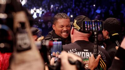 Tyson Fury interacts with Joe Joyce after his win over Derek Chisor. Getty