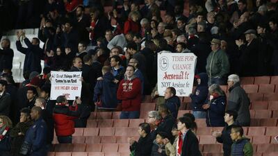 General view of empty seats as Arsenal fans display banners in protest against manager Arsene Wenger. Paul Childs / Reuters