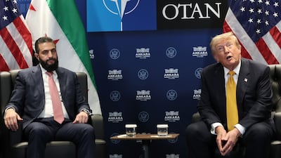 Syrian President Ahmad Al Shara and US President Donald Trump at the Nato summit in Ankara. Getty Images