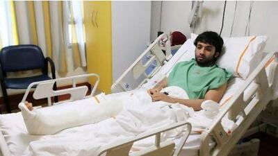 Mohammed Ibrahim is being treated for deep cuts,a dislocated knee and a head injury at Rashid Hospital after being attacked by a gang outside his home in Al Quoz three weeks ago.