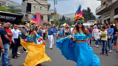 Members of a music band play as they march during Cherry Day in the village of Hammana, southeast of Beirut, Lebanon. EPA